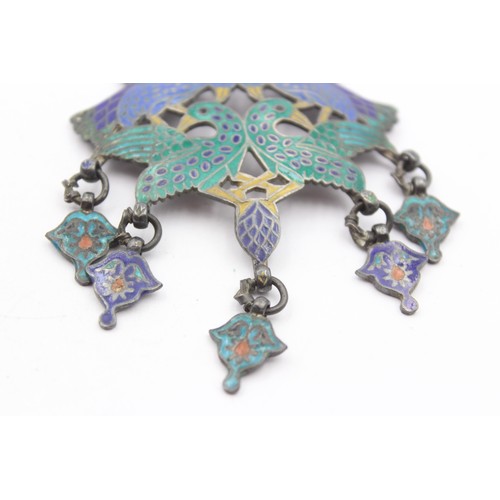 224 - Murlidhar Multan, an Indian Rupee silver and enamel bird pendant, 8 x 6cm, chain, 42gm