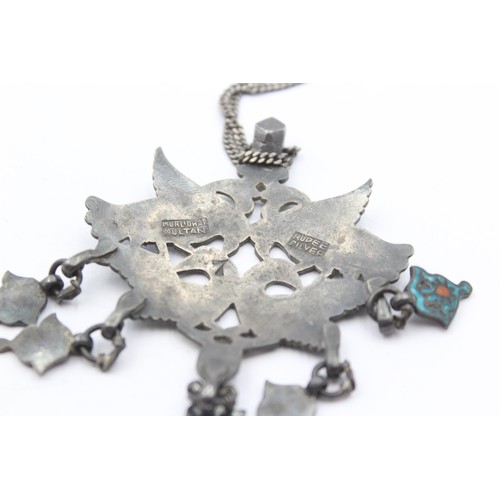 224 - Murlidhar Multan, an Indian Rupee silver and enamel bird pendant, 8 x 6cm, chain, 42gm