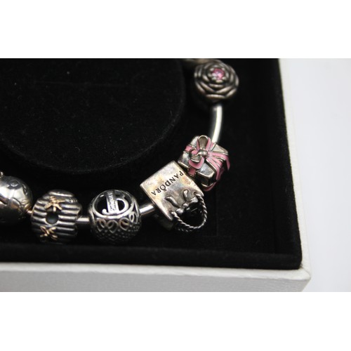 226 - Pandora, a silver charm bracelet, 36gm, cbox.