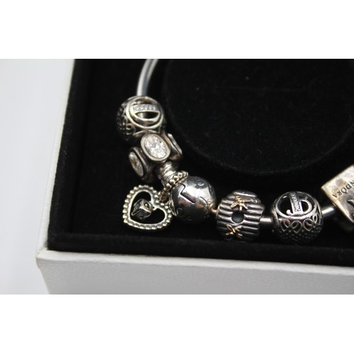 226 - Pandora, a silver charm bracelet, 36gm, cbox.