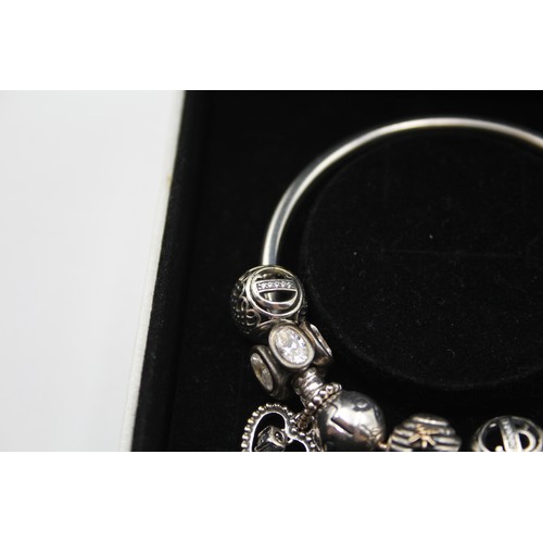 226 - Pandora, a silver charm bracelet, 36gm, cbox.