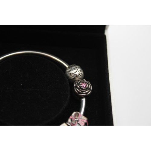 226 - Pandora, a silver charm bracelet, 36gm, cbox.