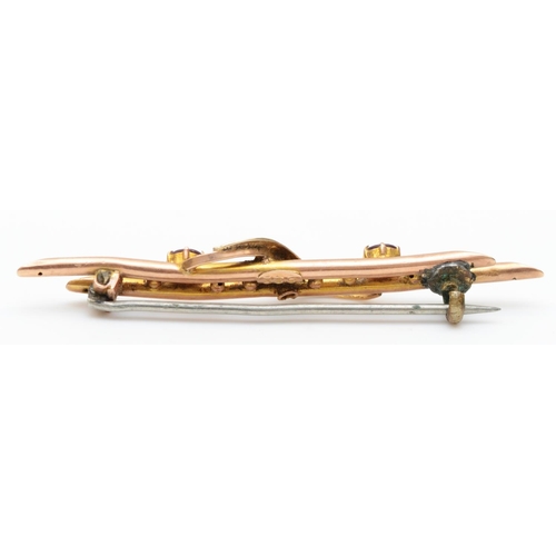 233 - A Victorian 9ct rose gold bar brooch, set with half pearls and a rubies, 48mm, 1.9gm