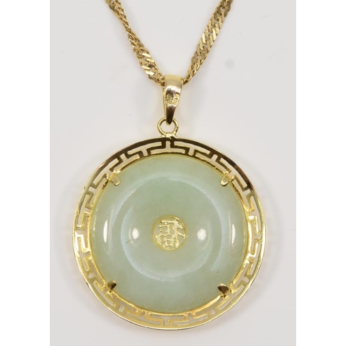 237 - A Chinese 14K gold and jadeite (untested) disc pendant 27mm with 14K gold chain, chain 3.2gm