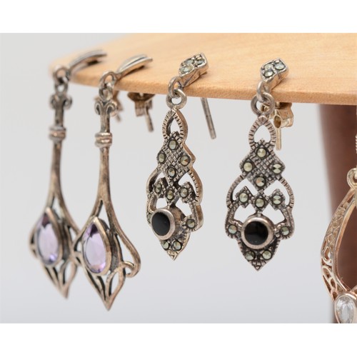 259 - Six pairs of silver and gemset ear rings, together with an ear ring stand