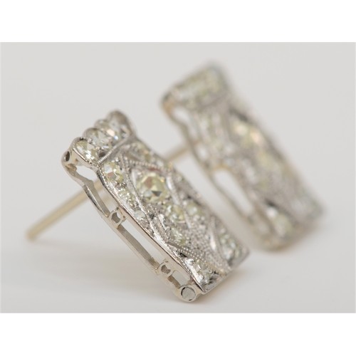 260 - An Art Deco white metal and diamond pair of ear studs, electronically tested as platinum, 12 x 10mm,... 