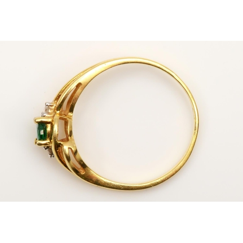 277 - An 18k gold emerald and brilliant cut diamond dress ring, stamped 750, N, 2.3gm