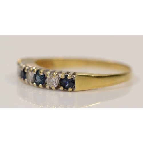 282 - An 18ct gold sapphire and brilliant cut diamond seven stone ring, P, 2gm