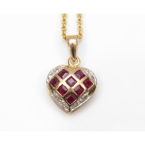 283 - A 9ct gold ruby and diamond heart shape checkerboard ring, O, with matching pendant, 6.1gm