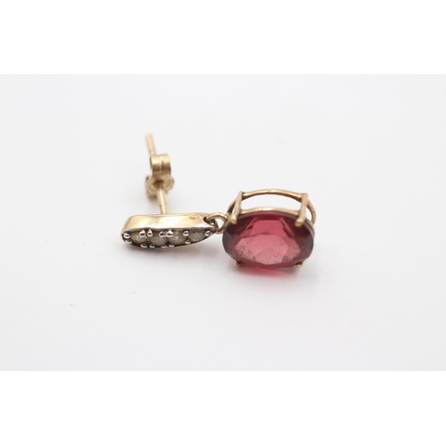 295 - A 9ct gold pair of garnet and brilliant cut diamond ear pendants, 18mm, 2.2gm