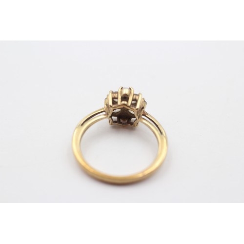 302 - A 9ct gold pale blue stone and white stone cluster ring, N, 2.7gm