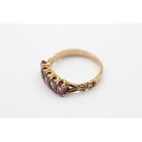 306 - A vintage 9ct gold and amethyst five stone ring, O, 2.5gm