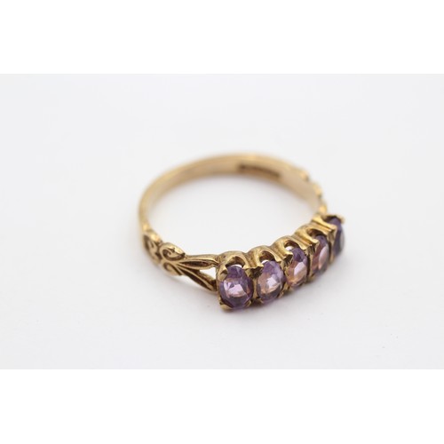 306 - A vintage 9ct gold and amethyst five stone ring, O, 2.5gm