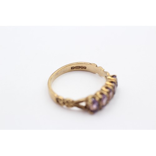 306 - A vintage 9ct gold and amethyst five stone ring, O, 2.5gm