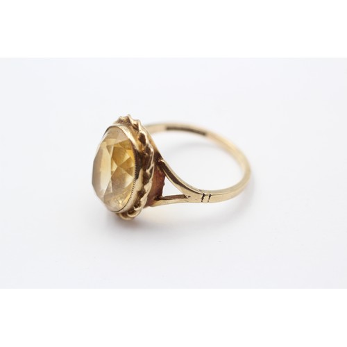 307 - A vintage 9ct gold and citrine dress ring, stone 14 x 10mm, N 1/2, 4gm