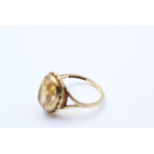 307 - A vintage 9ct gold and citrine dress ring, stone 14 x 10mm, N 1/2, 4gm