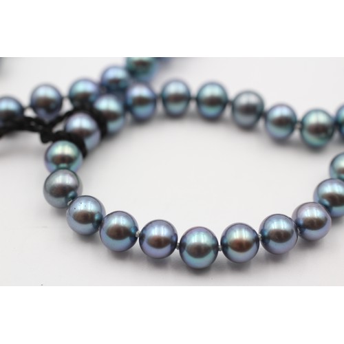 312 - A single row 6mm bead grey cultured pearl necklace, 9ct gold clasp, 44cm.