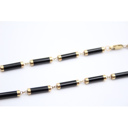 315 - A 9ct gold and onyx panel necklace, 40cm