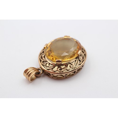 319 - A 14ct gold and citrine pendant, stone, 18 x 15mm, 7.1gm