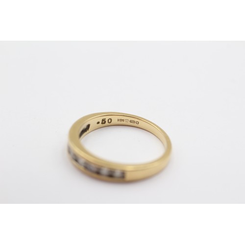 324 - An 18ct gold and brilliant cut diamond channel set half eternity ring, stated weight 0.50cts, L 1/2,... 