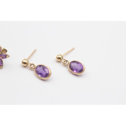 330 - Two pairs of 9ct gold and amethyst earrings, 1.3gm