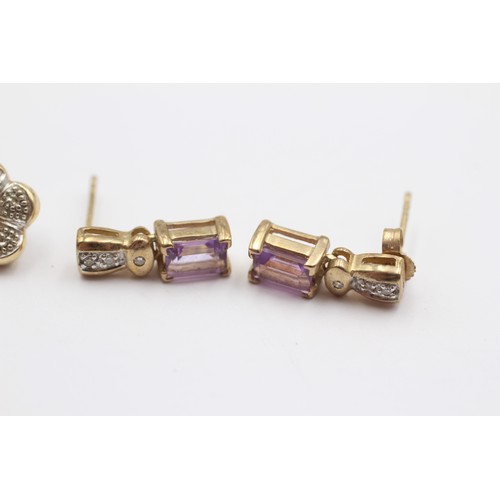 332 - A 9ct gold pair of cabochon sapphire and diamond cluster ear studs and an amethyst and diamond pair,... 