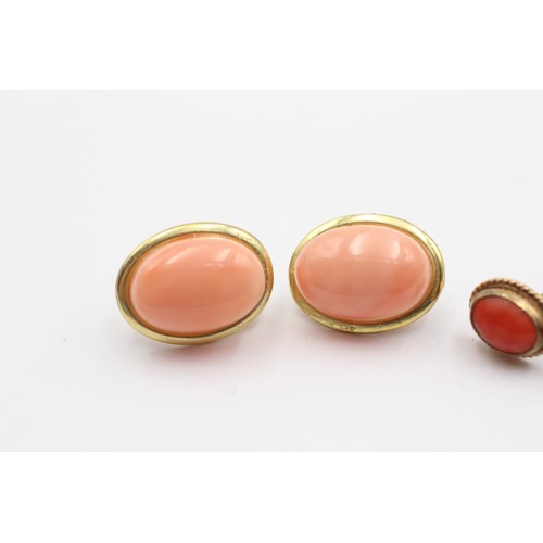 334 - Two pairs of 9ct gold mounted coral ear rings, the largest coral 14 x 9mm, 5.3gm