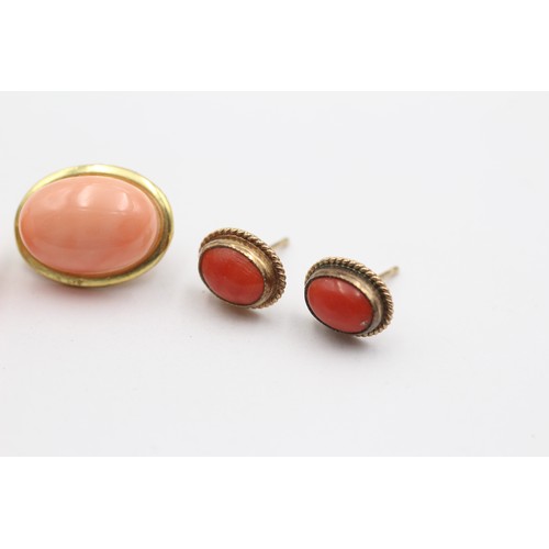 334 - Two pairs of 9ct gold mounted coral ear rings, the largest coral 14 x 9mm, 5.3gm