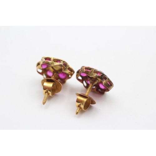 335 - A pair of Indian gold, pearl and synthetic ruby ear studs, tests as 9ct gold, 3.3gm