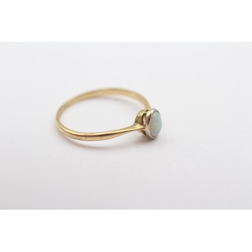 338 - A vintage 18ct gold and plat opal single stone ring, 6 x 4mm, P, 1.7gm