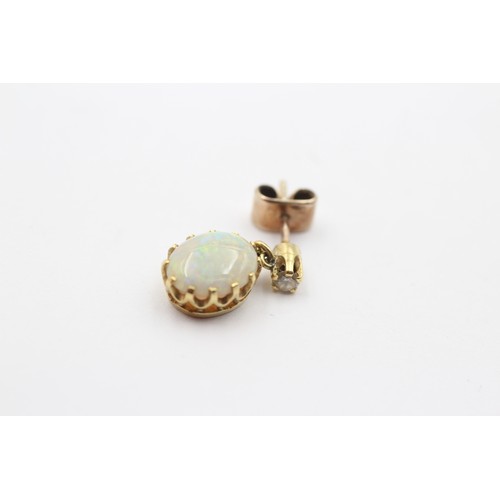 345 - A pair of 18ct gold brilliant cut diamond and opal drop ear rings, opals 9 x 7mm with good colour pl... 