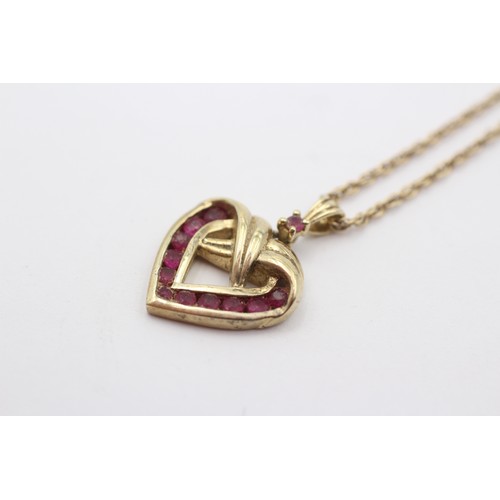 348 - A 9ct gold and ruby openwork heart pendant, 15 x 17mm, chain, 4.7gm