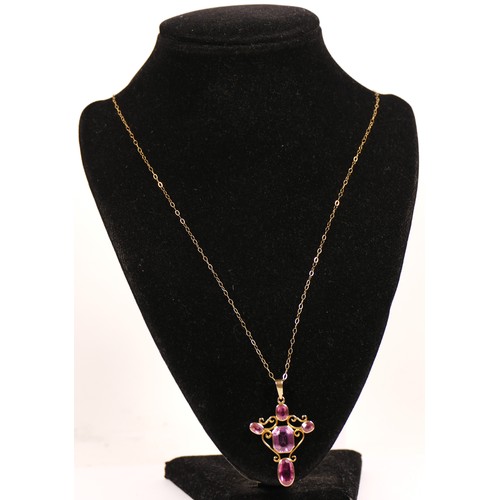 349 - An antique gold pink tourmaline and pink paste (central stone) cross pendant, tests as 9ct gold, 42 ... 