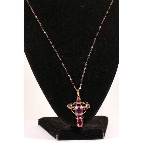 349 - An antique gold pink tourmaline and pink paste (central stone) cross pendant, tests as 9ct gold, 42 ... 