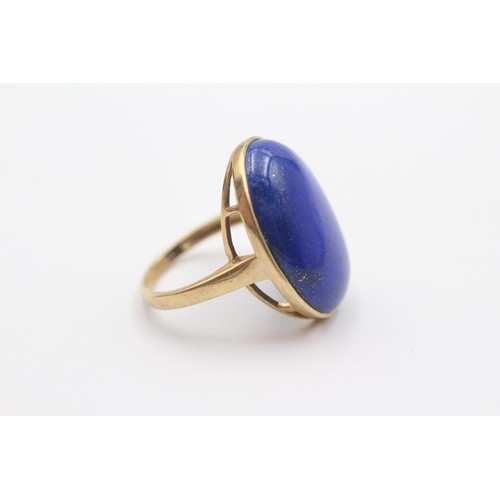 354 - A 9ct gold and lapis lazuli dress ring, 24 x 17mm, T, 7.5gm