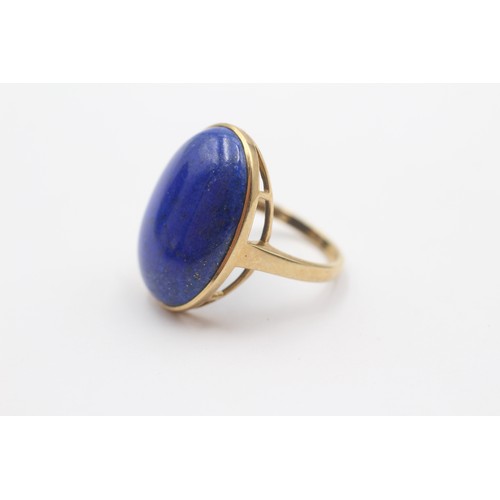 354 - A 9ct gold and lapis lazuli dress ring, 24 x 17mm, T, 7.5gm