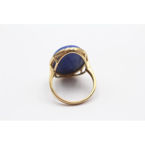 354 - A 9ct gold and lapis lazuli dress ring, 24 x 17mm, T, 7.5gm