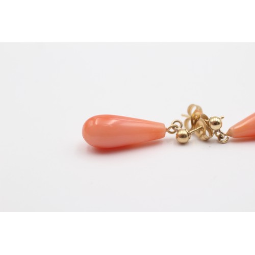 356 - A pair of 9ct gold mounted coral drop ear rings, 20mm