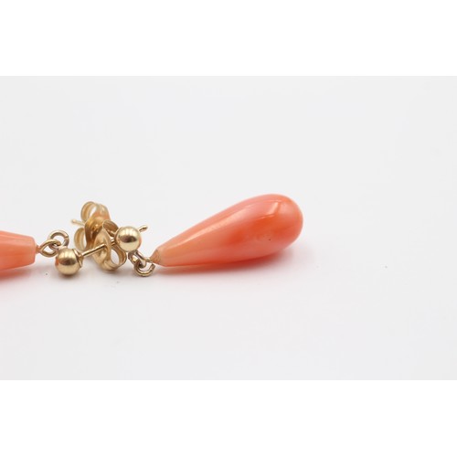 356 - A pair of 9ct gold mounted coral drop ear rings, 20mm