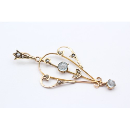 363 - An Edwardian 9ct gold aquamarine and half pearl openwork pendant, 45mm, 1.4gm