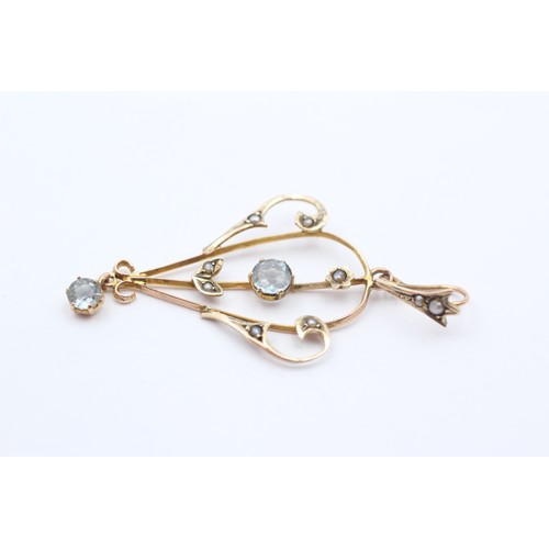 363 - An Edwardian 9ct gold aquamarine and half pearl openwork pendant, 45mm, 1.4gm