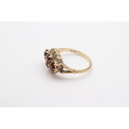 364 - A vintage 9ct gold garnet and half pearl dress ring, O, 3.1gm