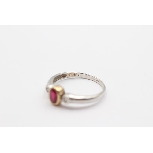 367 - A 9ct white gold, synthetic ruby and brilliant cut diamond three stone ring, P 1/2, 2.1gm