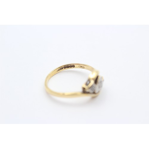 374 - A vintage 18ct gold and diamond three stone heart ring, L, 2.7gm