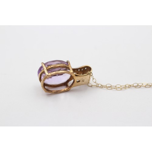 377 - A 9ct gold amethyst and diamond pendant, 18mm, chain, 2.4gm