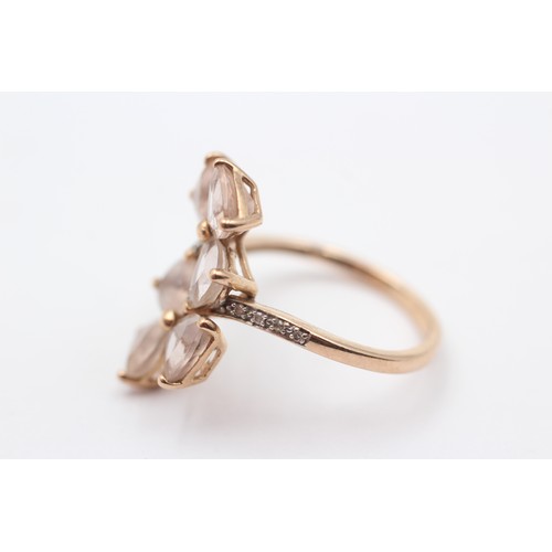 387 - A 9ct gold morganite and diamond dress ring, S, 4gm