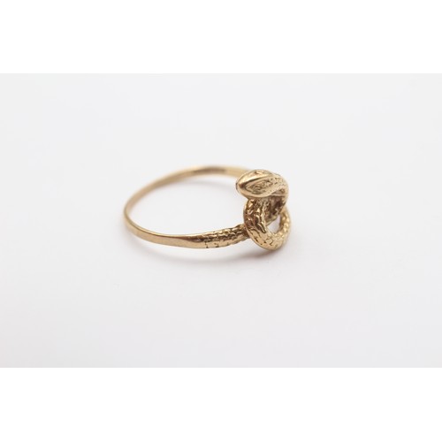 396 - A 9ct gold coiled snake ring, S, 2.5gm