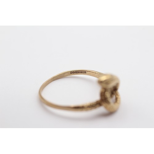 396 - A 9ct gold coiled snake ring, S, 2.5gm