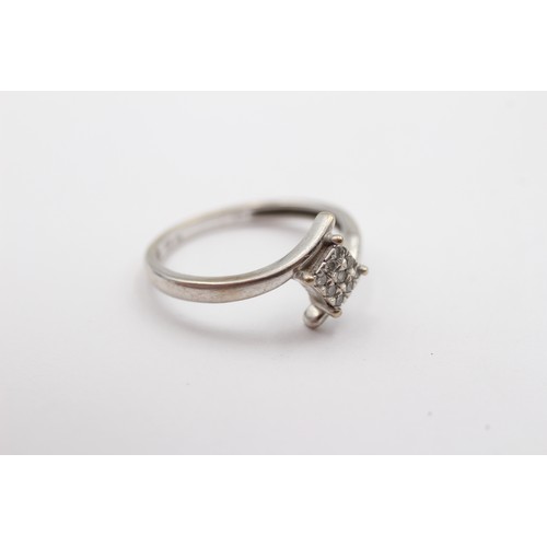 410 - A 9ct white gold and brilliant cut diamond square cluster ring, stated weight 0.15cts, N 1/2, 2gm