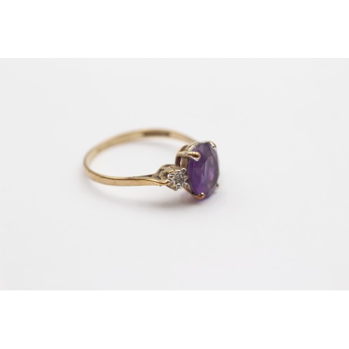 411 - A 9ct gold amethyst and diamond ring, N, 1.5gm